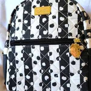 Bestey Johnson black and white mini back pack.
